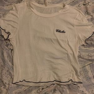 White “clueless” short sleeve crop top